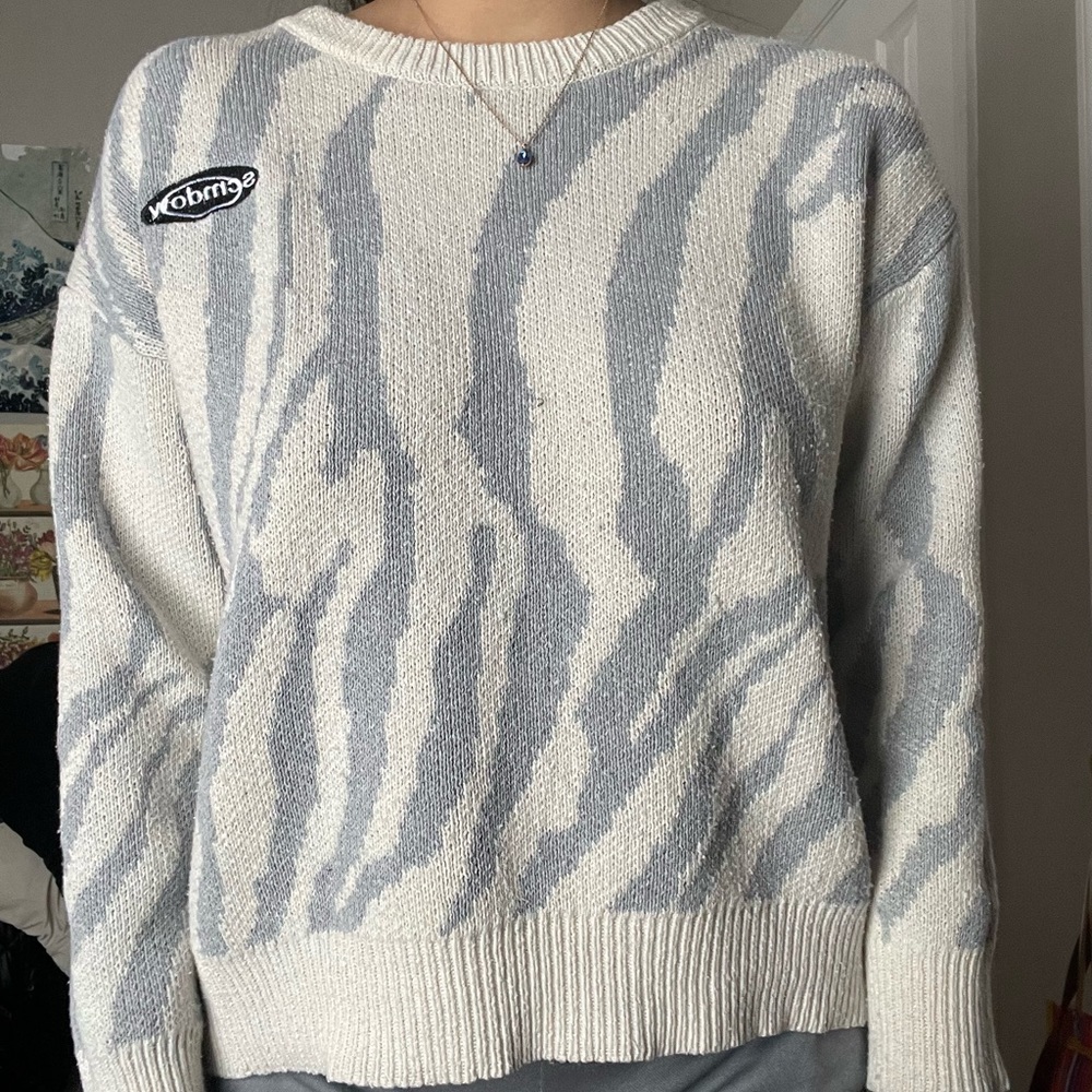 Blue and white knit sweater